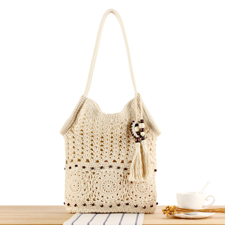 Hand-knotted macrame bag with playful pendant Stornfield