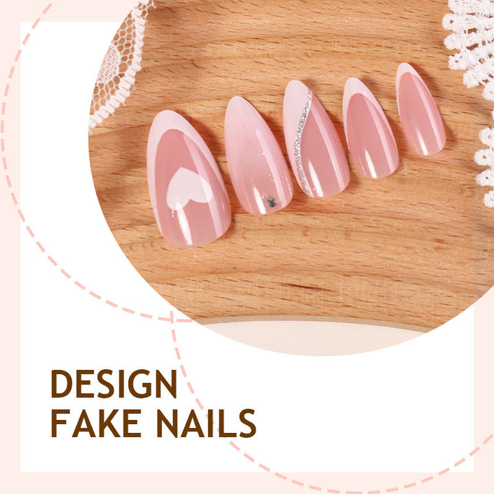 Acrylic nail set with romantic heart and glitter accents Stornfield