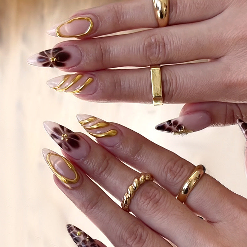 Nail art set with luxurious 3D decorations and golden accents Stornfield