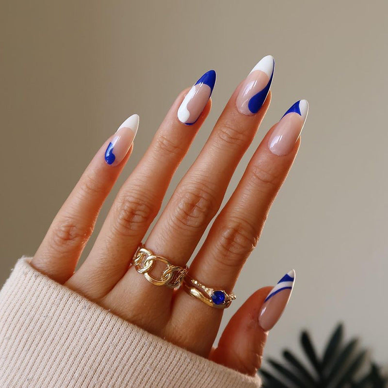 Artful nail extensions with an elegant leaf pattern Stornfield