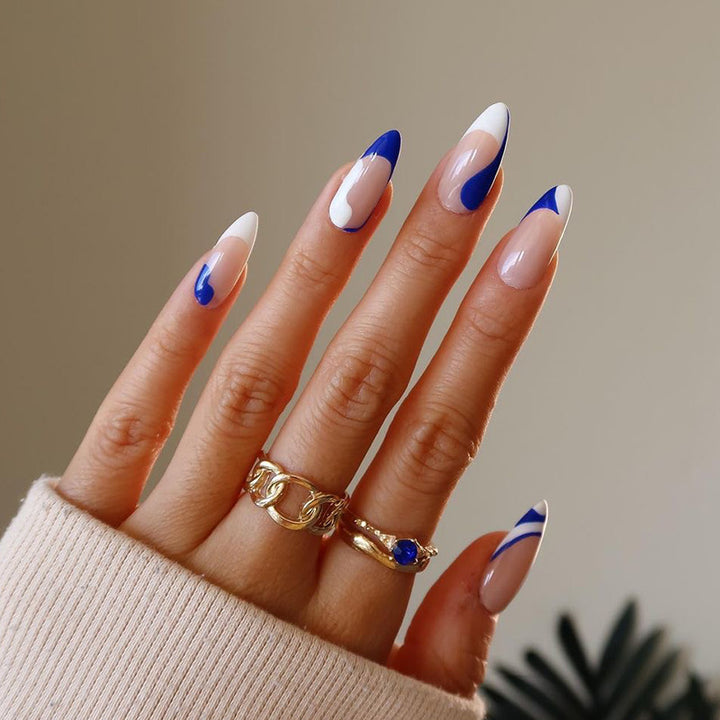Artful nail extensions with an elegant leaf pattern Stornfield