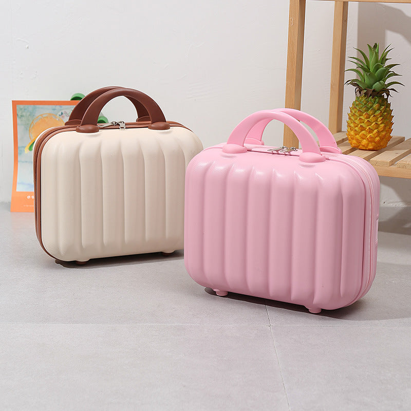 compact hardshell vanity travel case with molded ribbed exterior cushioned organizer panels and dual-lock zipper Stornfield