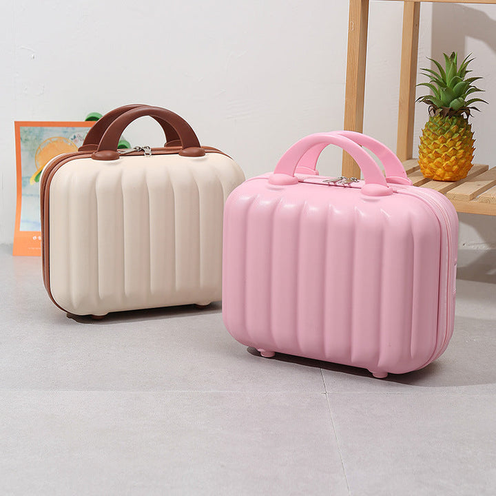 compact hardshell vanity travel case with molded ribbed exterior cushioned organizer panels and dual-lock zipper Stornfield