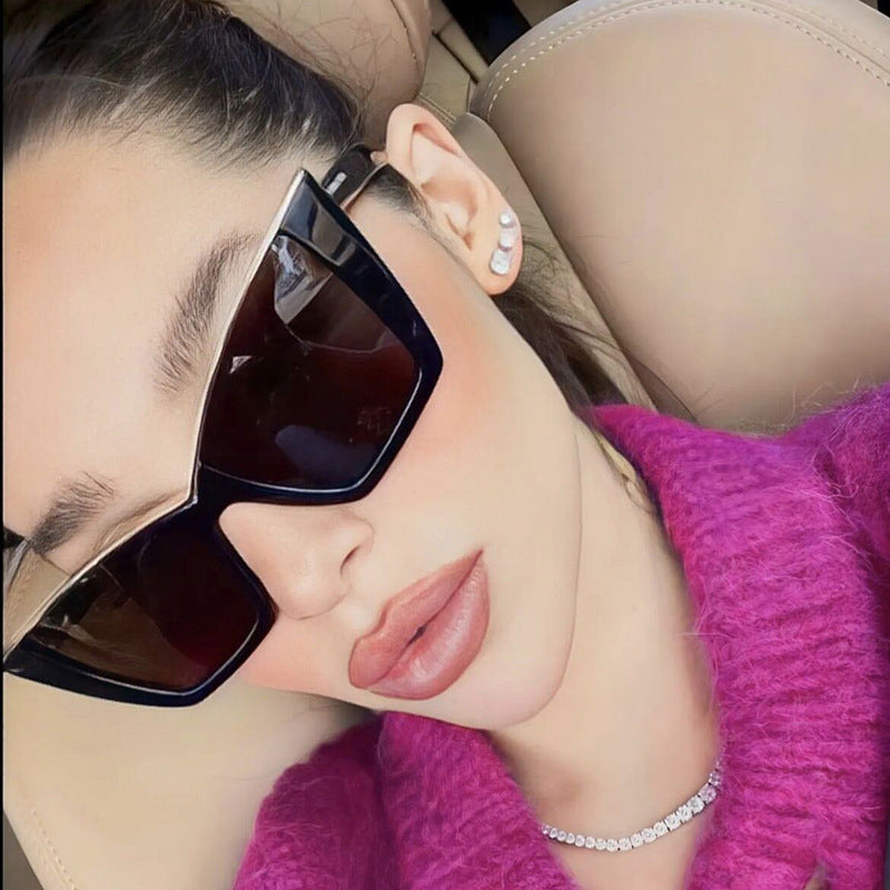 Women extravagant sunglasses with unique design and golden accents Stornfield