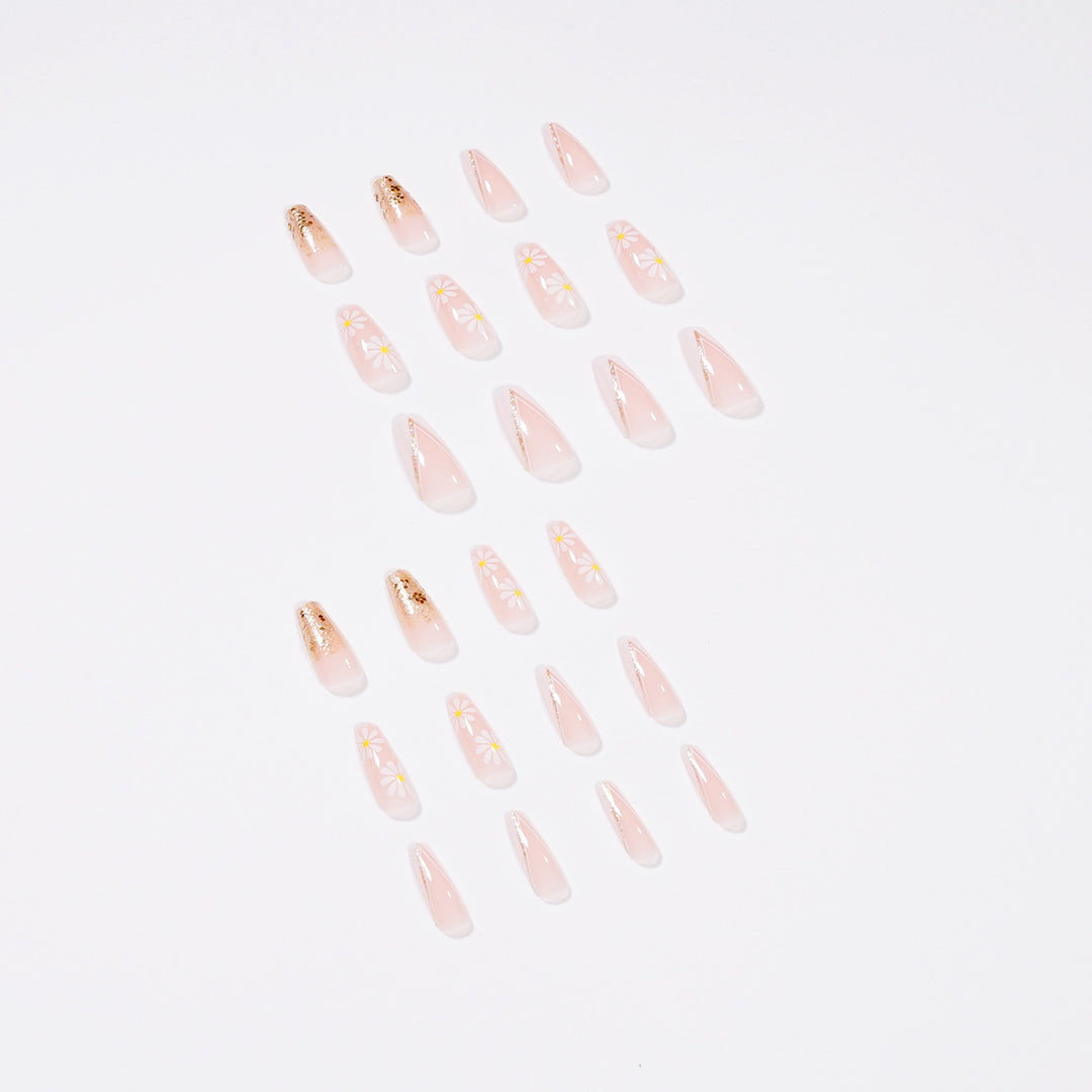 Artful nail extensions with floral designs and glitter accents Stornfield