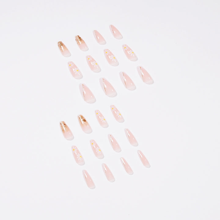 Artful nail extensions with floral designs and glitter accents Stornfield