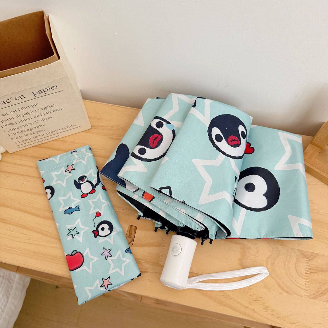 Ladies collapsible umbrella with playful penguin design Stornfield