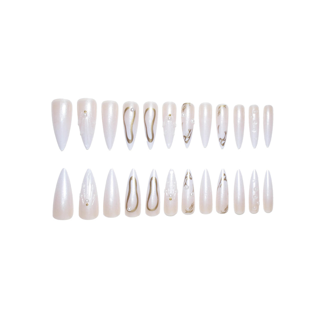 Artistic Press-On Nail Designs with Pearl Accents Stornfield