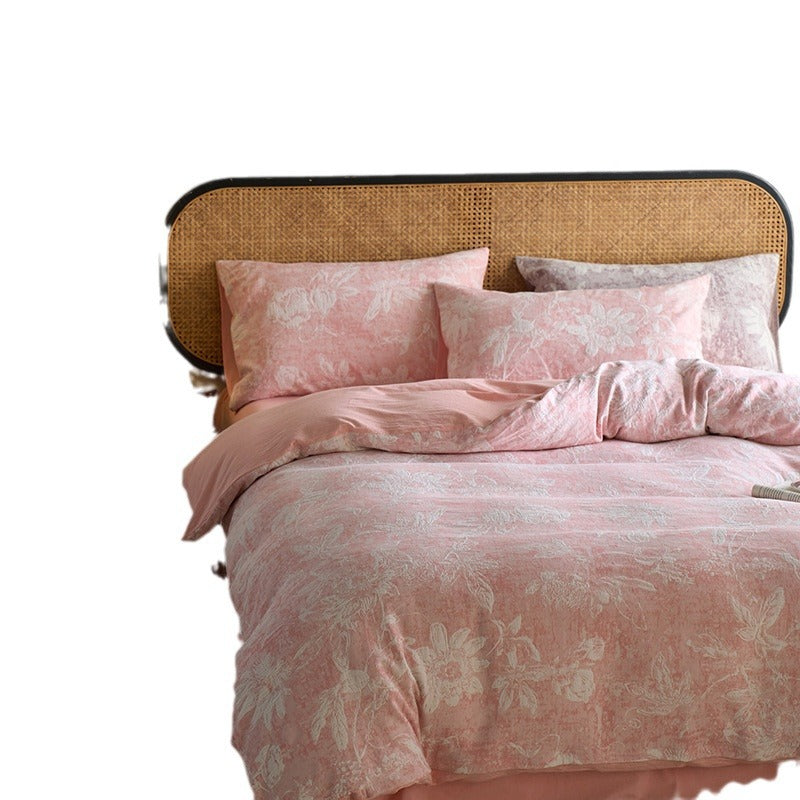 Reversible cotton bedding set with floral toile print and linen look
