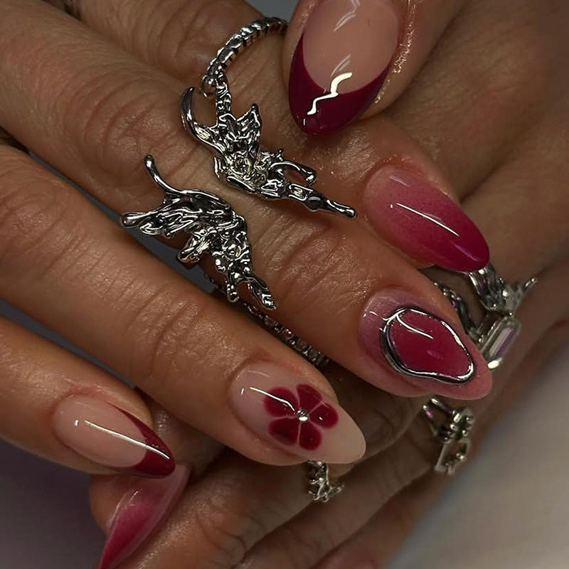 Artificial nail set with elegant flower and ombre accents Stornfield