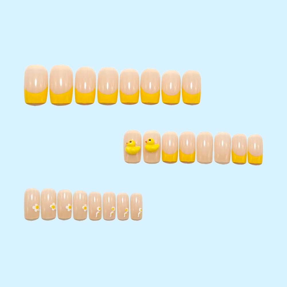 Artificial nails with playful duck design and summery color gradient Stornfield