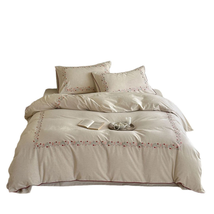 Linen bedding set with floral embroidery border