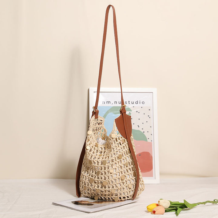 Hand-knotted shoulder bag with metal appliqués Stornfield