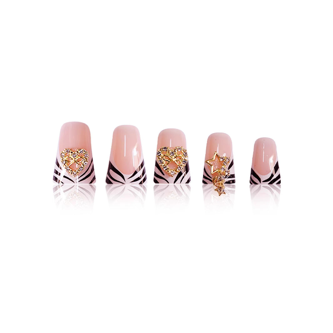 Artistic Zebra-Patterned Nail Enhancements with Gem Accents Stornfield