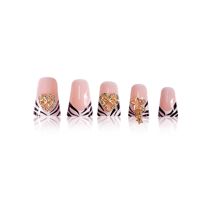 Artistic Zebra-Patterned Nail Enhancements with Gem Accents Stornfield