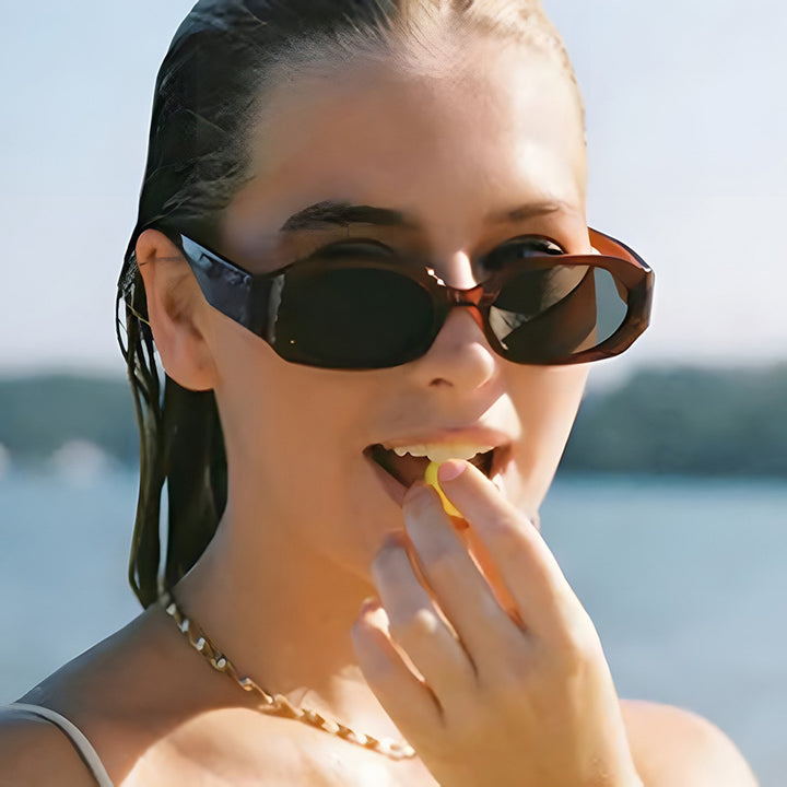 Women extravagant sunglasses in stylish retro design Stornfield