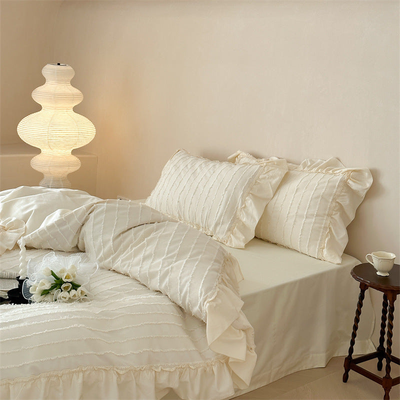 Bedding set with ruffles and ribbed stripe texture