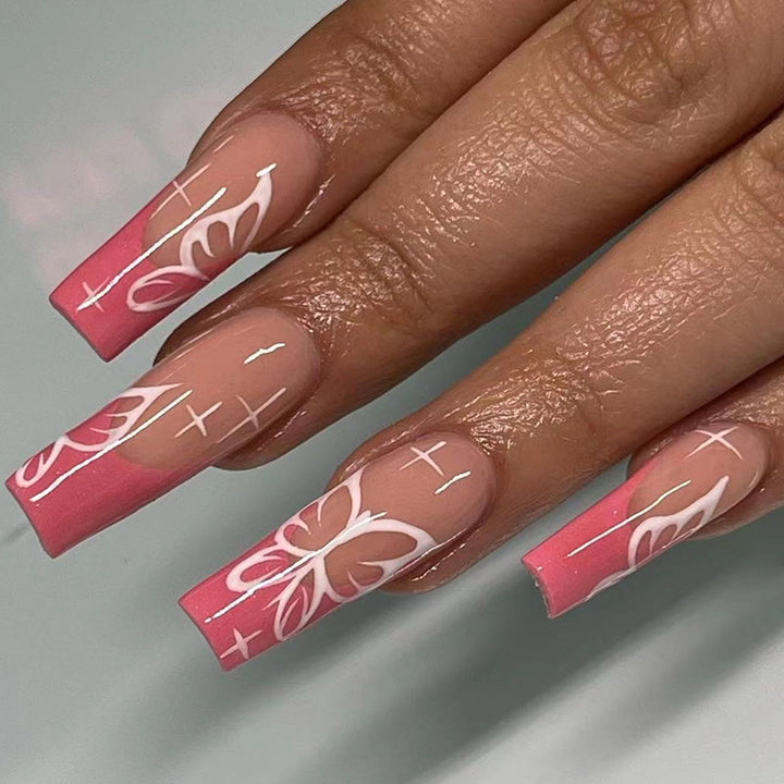Artful stiletto nails with colorful butterfly design Stornfield