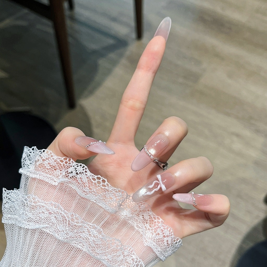 Elegant Long Press-On Nails with Decorative Accents Stornfield