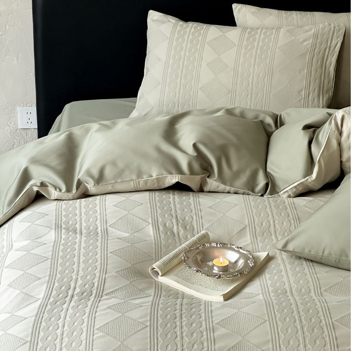 Structured bedding set with embossed cable pattern
