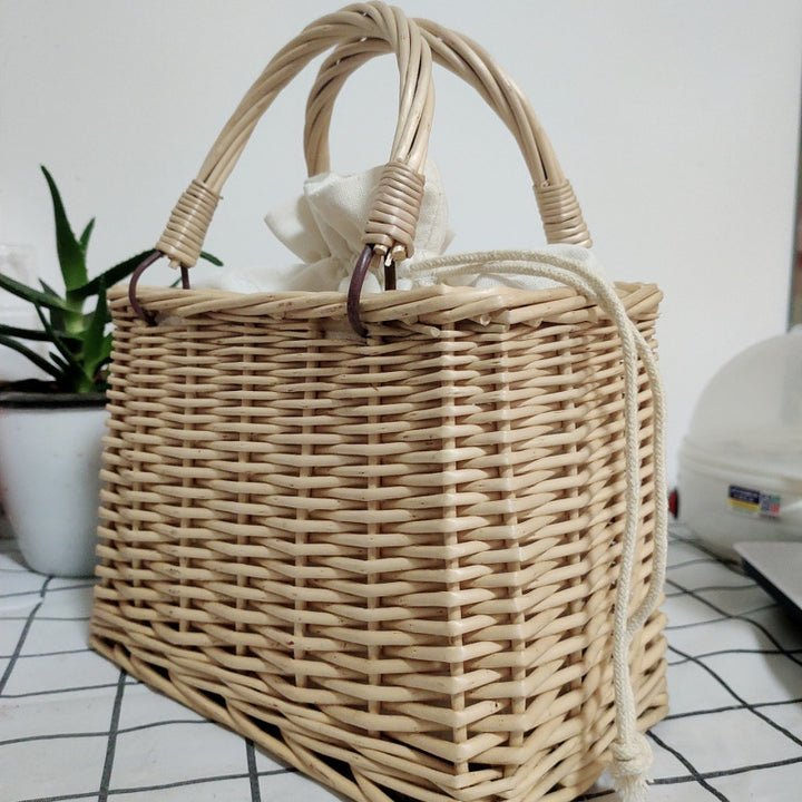 Women's handbag made of braided material with cotton drawstring closure Stornfield