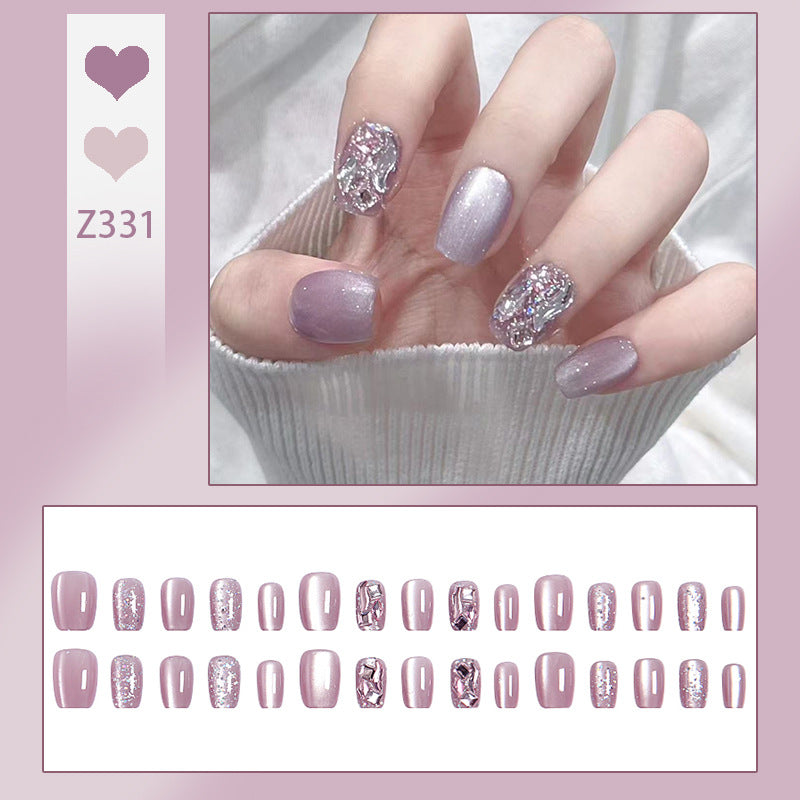 Artificial nail set with glitter and metallic effects Stornfield