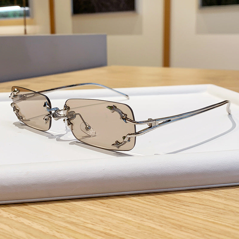 Women's fashionable sunglasses with delicate metal frame and transparent lenses Stornfield