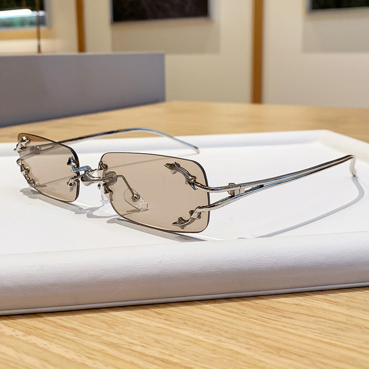 Women's fashionable sunglasses with delicate metal frame and transparent lenses Stornfield