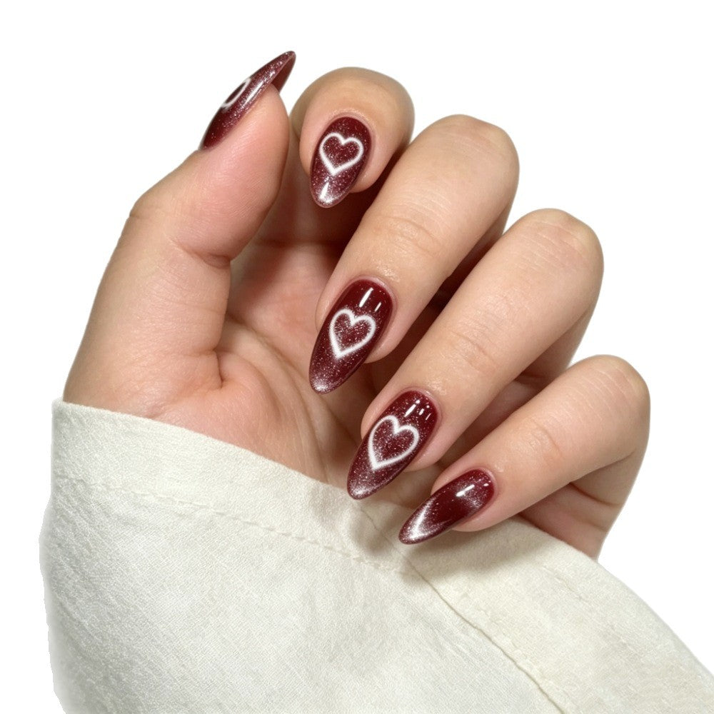 Artificial nails with luxurious heart design and shimmering finish Stornfield