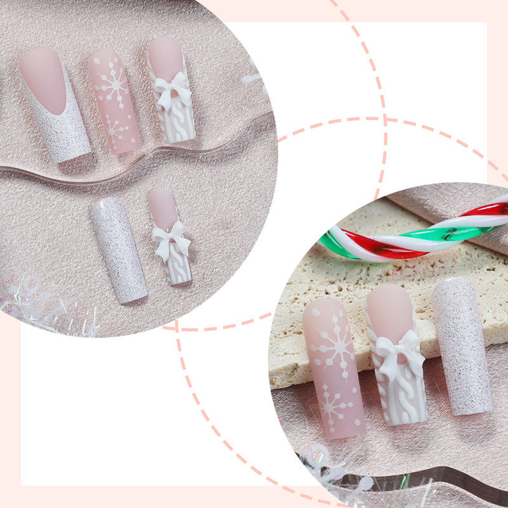 Artificial nail set with luxurious glitter and floral accents Stornfield
