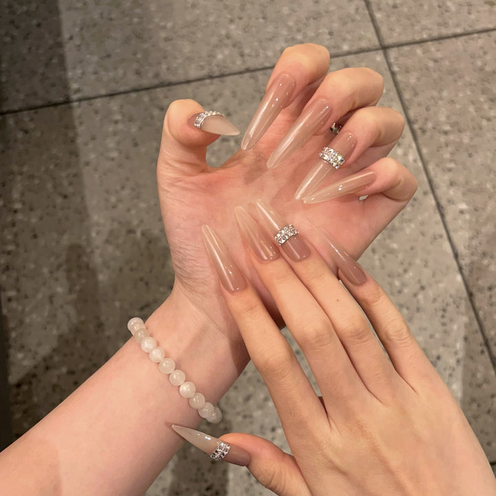 Stiletto Nail Art Tips with Rhinestone Accents Stornfield