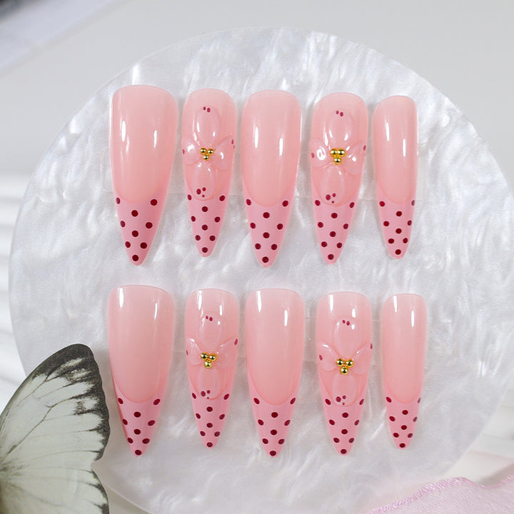 Artificial nail set with romantic flower and polka dot designs Stornfield