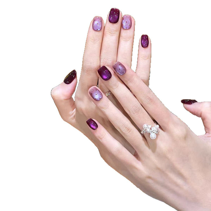 Artificial nails with ombre effect and glitter Stornfield