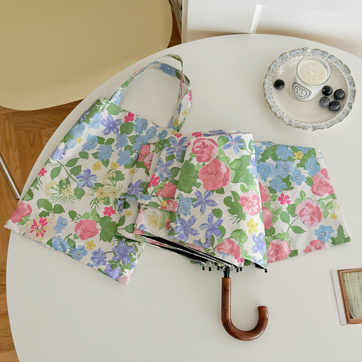 Women Folding Umbrella with Exquisite Floral Design Stornfield