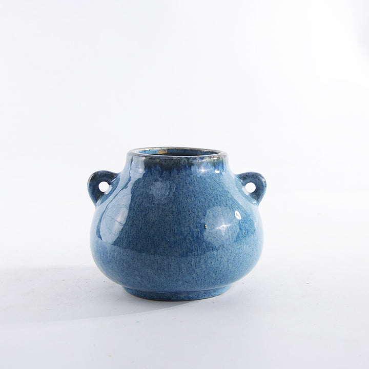 Decorative ceramic pot with playful handles Stornfield