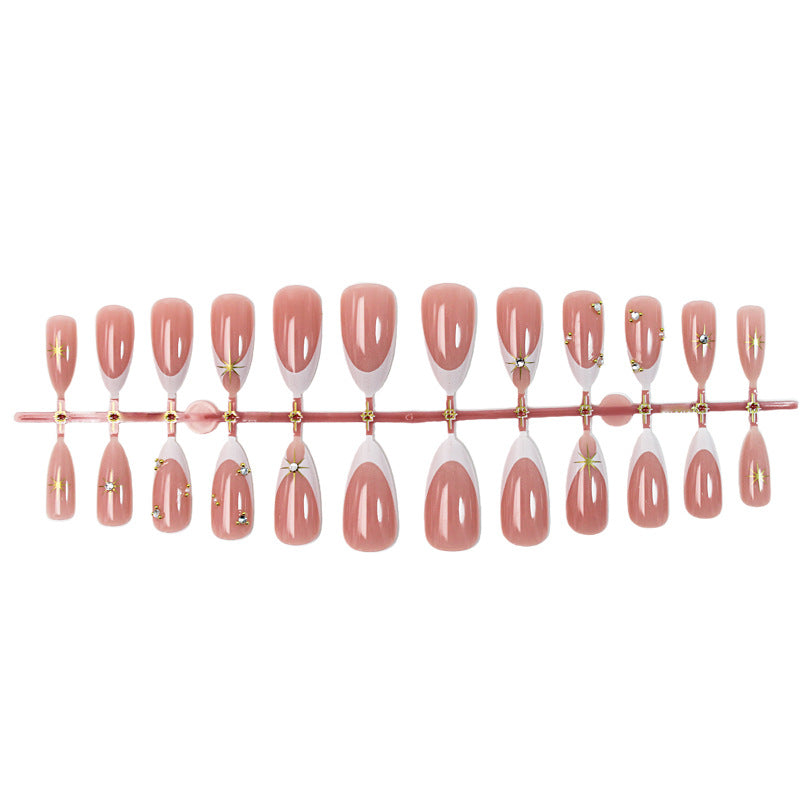 Artificial nail set with elegant tips and glitter accents Stornfield