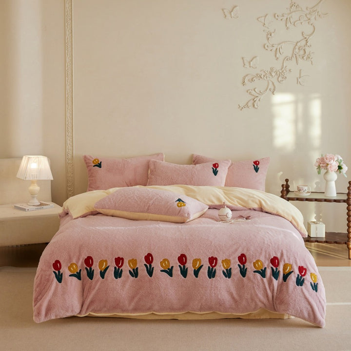 Plush duvet cover set with embroidered tulips, cozy teddy fleece, reversible function, and matching pillowcases