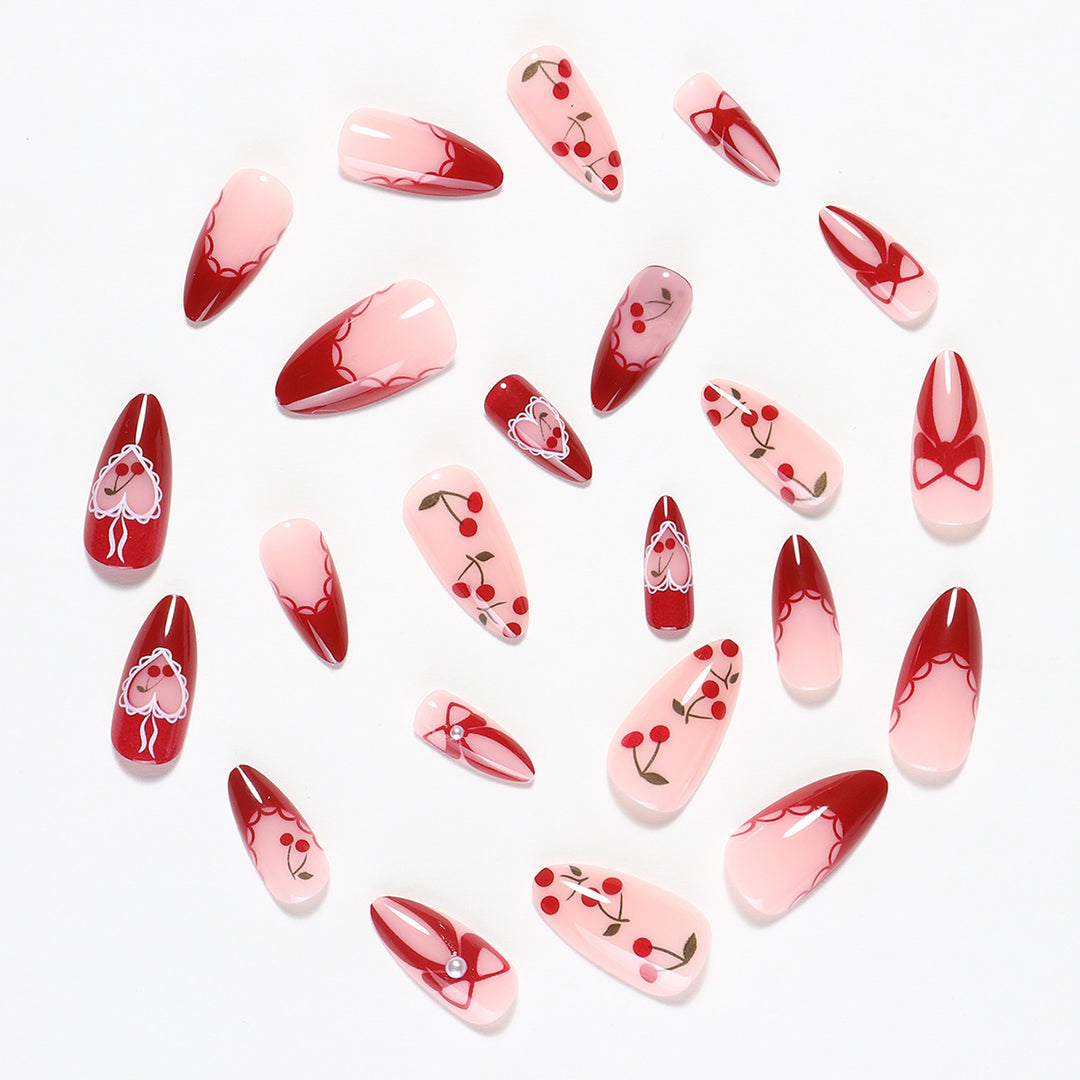 Creative nail set with romantic heart and bow accents Stornfield