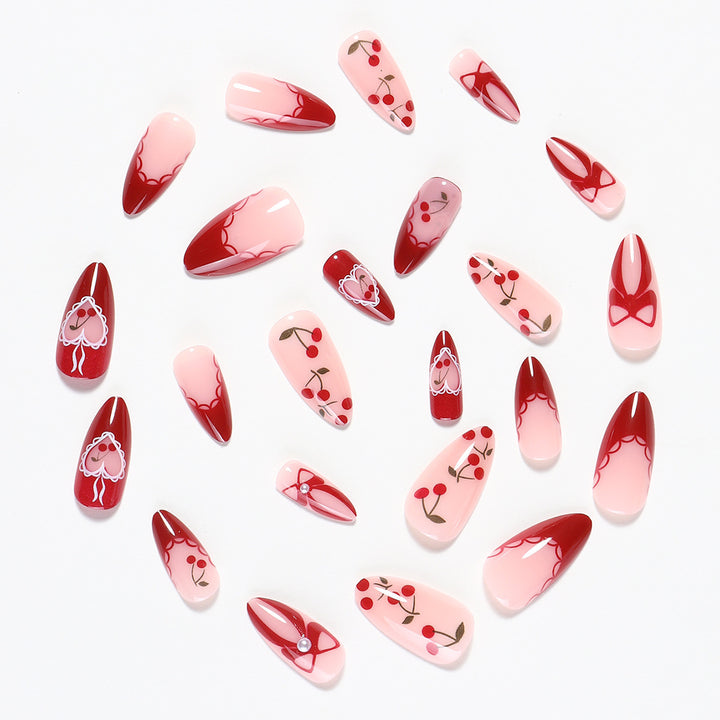 Creative nail set with romantic heart and bow accents Stornfield