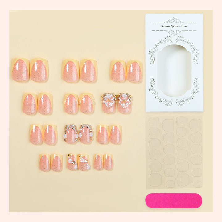 Nail art set with glamorous glitter and flower accents Stornfield