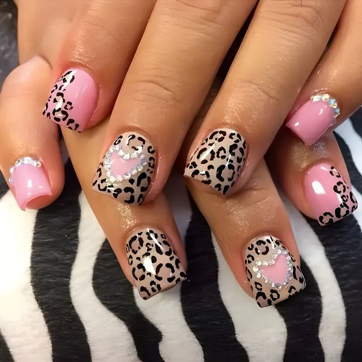 Glamorous artificial nail collection with animal motif and crystal embellishments Stornfield