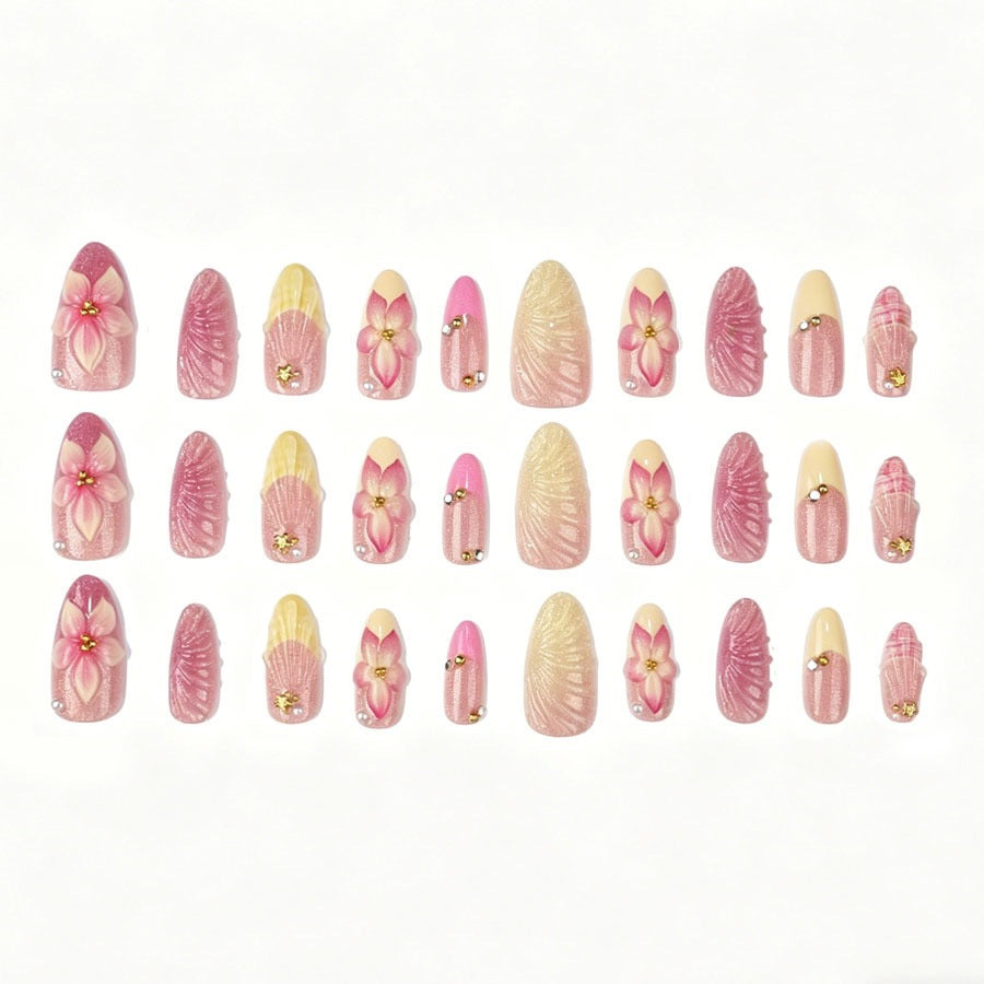 Artificial nail set with elaborate flower and shell patterns Stornfield
