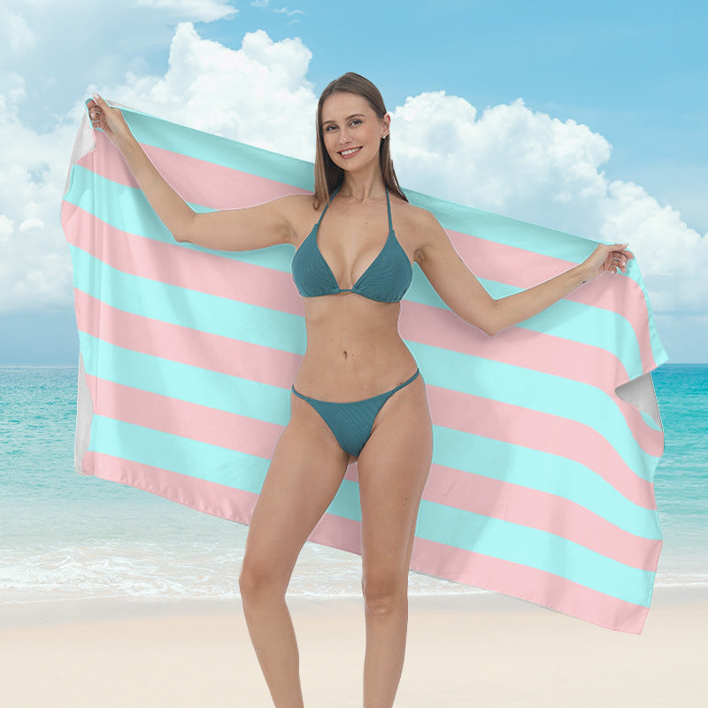 Beach towel with vibrant tropical plant motif Stornfield