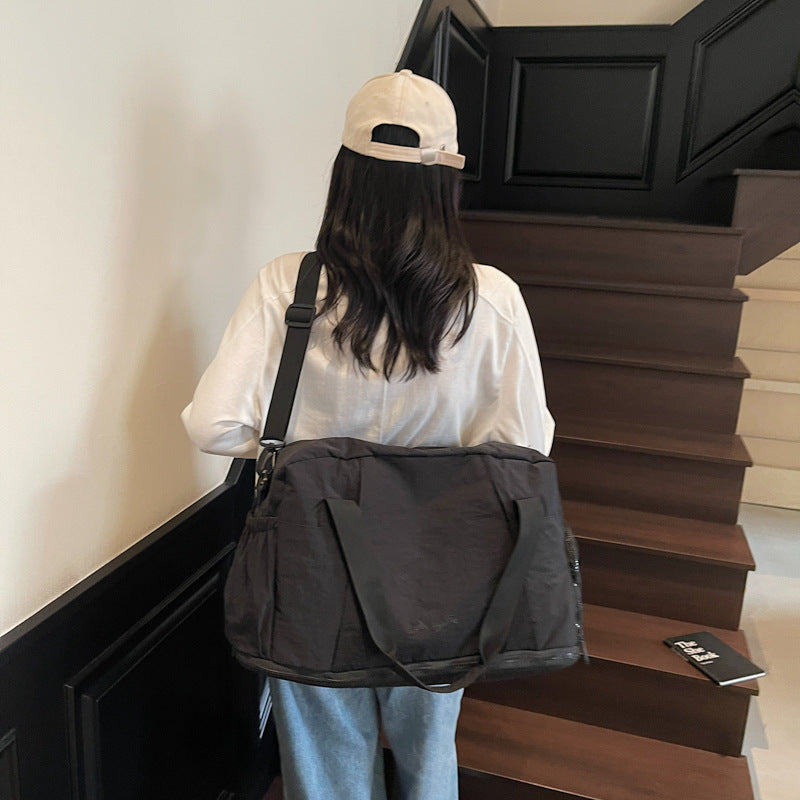 Sporty travel bag with practical outer pockets Stornfield