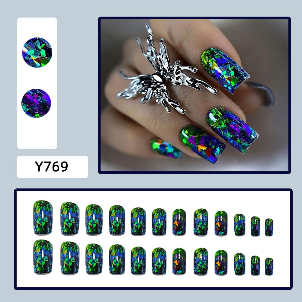 Artificial nails with sparkling glitter design and holographic accents Stornfield
