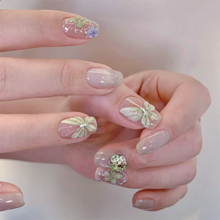Elegant Nail Art with Floral Accents Stornfield