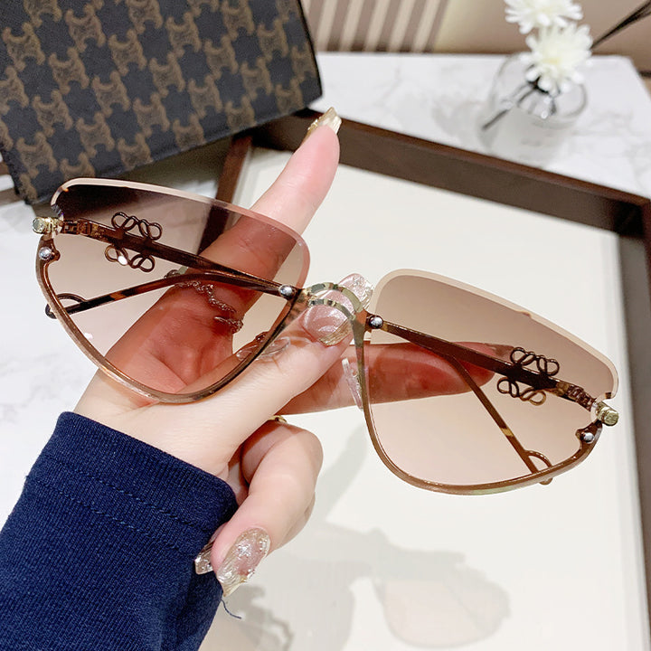 Ladies extravagant sunglasses with modern, geometric frame Stornfield
