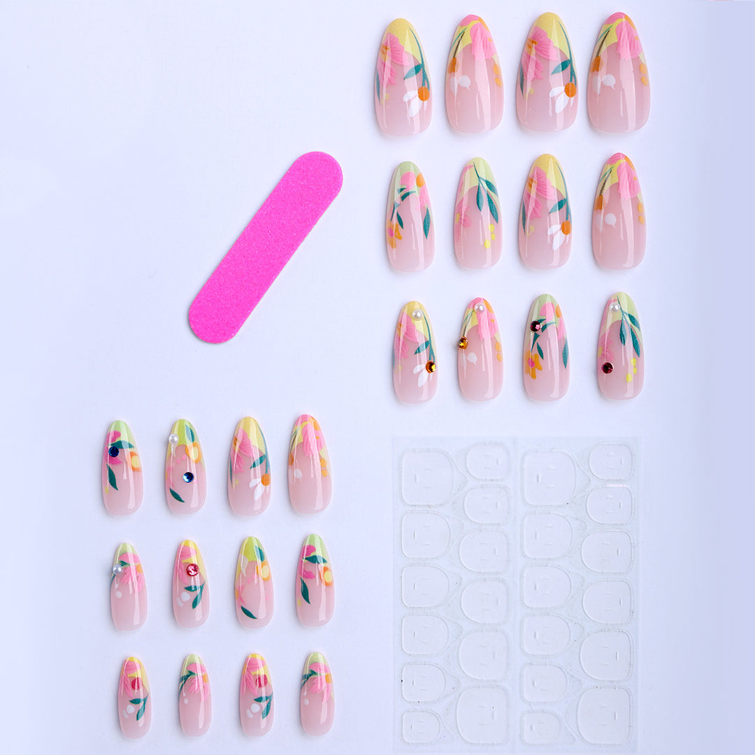 Artificial nails with flower design and glitter accents Stornfield