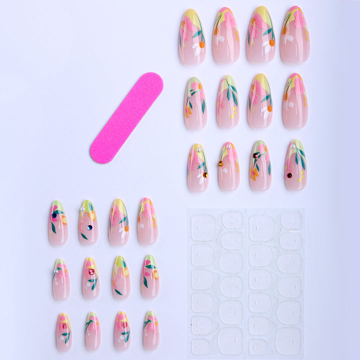 Artificial nails with flower design and glitter accents Stornfield