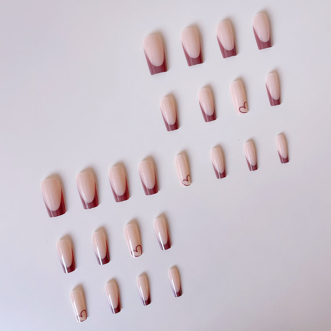 Glamorous artificial nails with elegant tips and heart design Stornfield